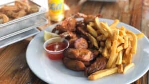 The Top 12 Best Restaurants In Aruba Foodie Guide 2024   Pelican Nest Pier Restauarant Our Favorite Restaurant In Aruba  300x169 