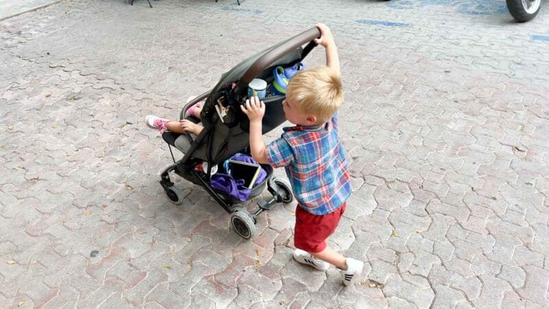 toddler pushing the Joolz Aer stroller