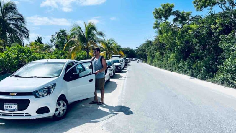 Parking car in Tulum Beach on the road